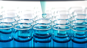 Test tubes with blue liquid for biocompatibility testing